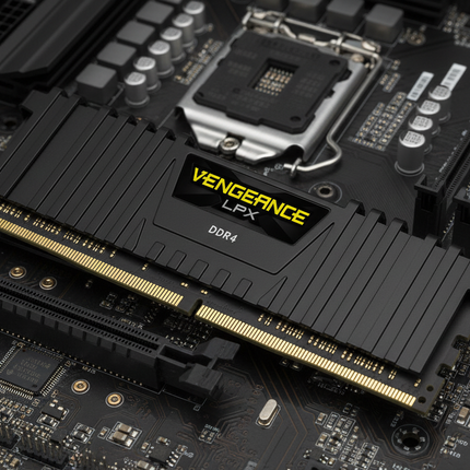 Close-up of a computer motherboard with Corsair Vengeance LPX RAM module.