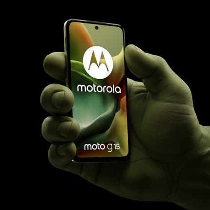 Hand holding a smartphone displaying the Motorola logo on a black background