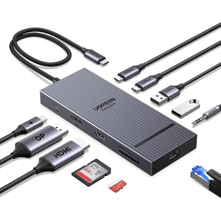 Ugreen USB-C hub with various cables and accessories on a white background