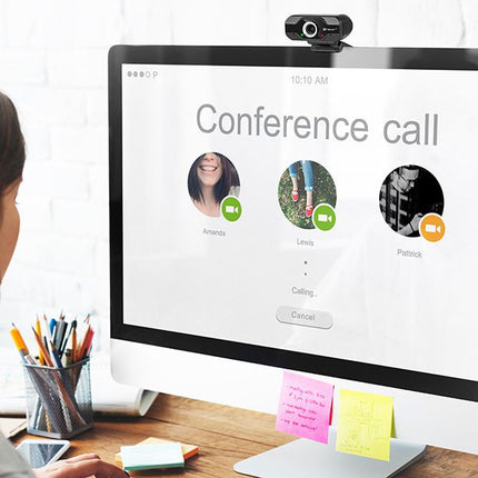 A desktop computer monitor showing a conference call interface with three participants, a black webcam mounted on top, and a person seated at a desk in a bright office setting.
Ueb kamera Tracer WEB007, Full HD(1920x1080@30fps), USB, mikrofon 24 mesetsa garantsia