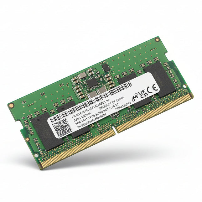 Close-up of a RAM module with branding on a background of similar RAM sticks.
micron_ddr5_sodim_8gb_5600