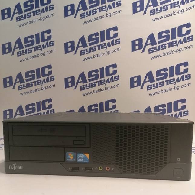 Поглед отпред на Компютър втора употреба Fujitsu ESPRIMO E9900 Desktop - CPU  i5 750 2.66GHz, 4GB RAM, 250GB HDD, GeForce GT 9300(512MB, DDR3). На бял фон с лого basic systems www.basic-bg.com. Виждат се два USB порта, два аудио порта, бутон за включване и двд.