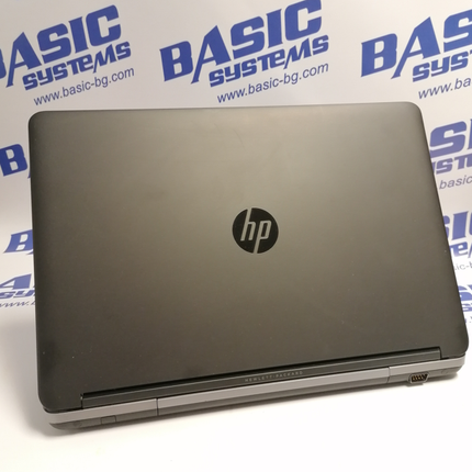 Лаптоп втора употреба HP ProBook 650 G1 - CPU i5-4300М, 4GB RAM, 128GB SSD, HD Graphics 4600. Поглед отзад при отворен дисплей. Вижда се сериен порт.