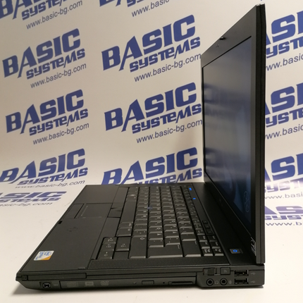 Снимка на Лаптоп втора употреба DELL Latitude E6400 от дясна страна в отворено положение на дисплея. Вижда се дисплея на лаптопа, камерата, клавиатурата, тъчпад, два usb порта, два аудио порта, записващо двд втора ръка. Лаптопа е сниман на бял фон с отпечатани лого и надписи basic systems, www.basic-bg.com.