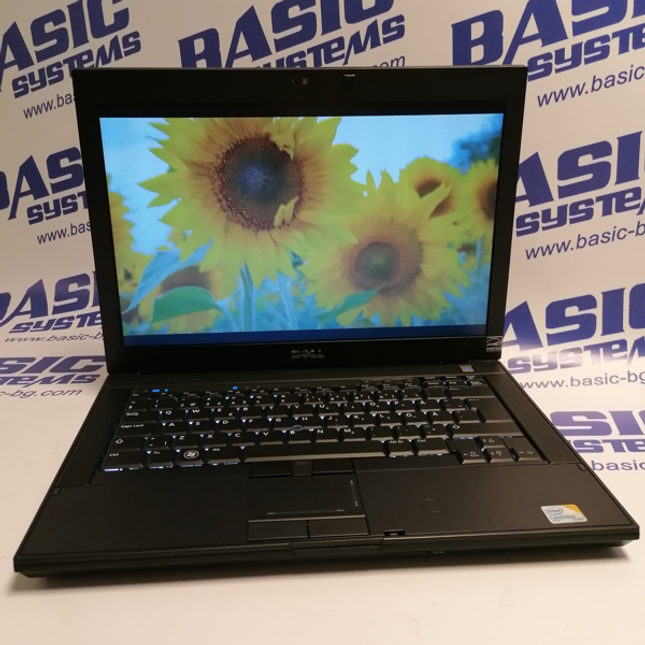 Снимка на Лаптоп втора употреба DELL Latitude E6400 отгоре в отворено положение на дисплея. Вижда се дисплея на лаптопа, камерата, клавиатурата, тъчпад и лого DELL в долната част на дисплея на лаптопа централно. Лаптопа е сниман на бял фон с отпечатани лого и надписи basic systems, www.basic-bg.com.