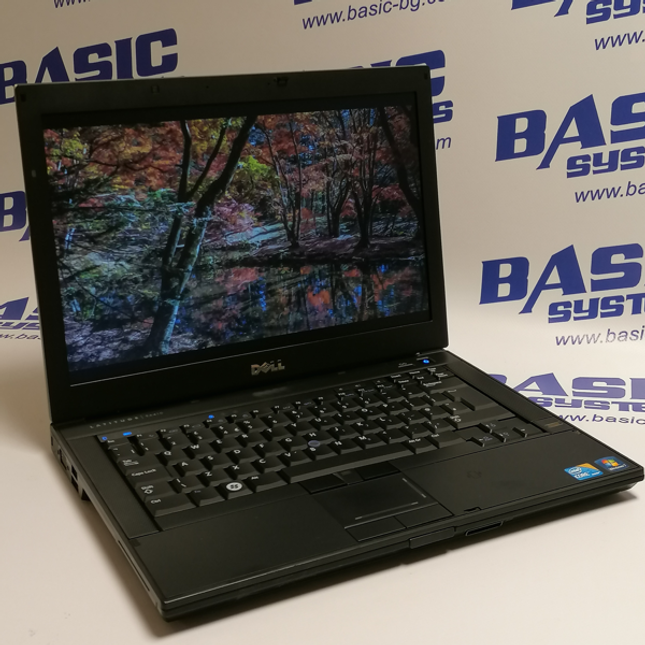 Снимка на Лаптоп втора употреба DELL Latitude E6410 - CPU i3-M370, 4GB RAM, 160GB HDD с поглед отгоре и от пред в отворено положение на дисплея. Вижда се дисплей с лого DELL, клавиатурата на лаптопа, тъчпад и ляв и десен говорител. Лаптопа е черен и е сниман на фона на лого basic systems и www.basic-bg.com.