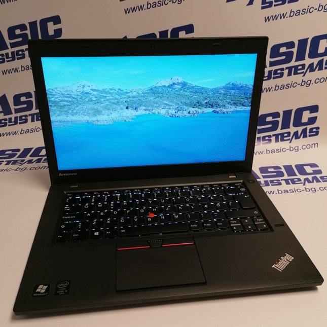 Поглед от горе на Лаптоп втора употреба Lenovo ThinkPad T450 - CPU i5-5300U, 8GB RAM, 240GB SSD, в отворено  положение на дисплея. На бял фон с лого basic systems и www.basic-bg.com. Виждат се 14 инчов дисплей, камера, лого ThinkPad, клавиатура втора ръка и тъчпад.